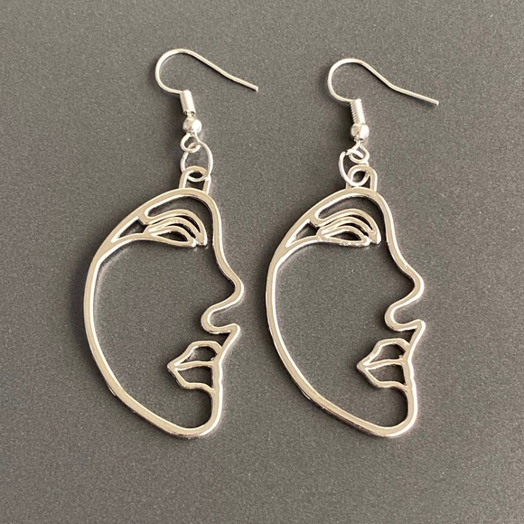 Jewelry - NEW Human Face Earrings in Silver color